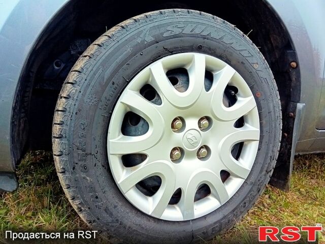 Серый Хендай и20, объемом двигателя 1.2 л и пробегом 181 тыс. км за 5600 $, фото 11 на Automoto.ua