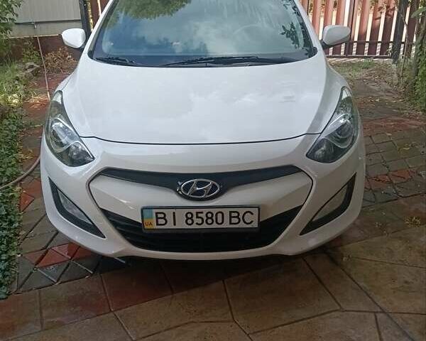 Белый Хендай i30, объемом двигателя 1.6 л и пробегом 133 тыс. км за 9300 $, фото 1 на Automoto.ua
