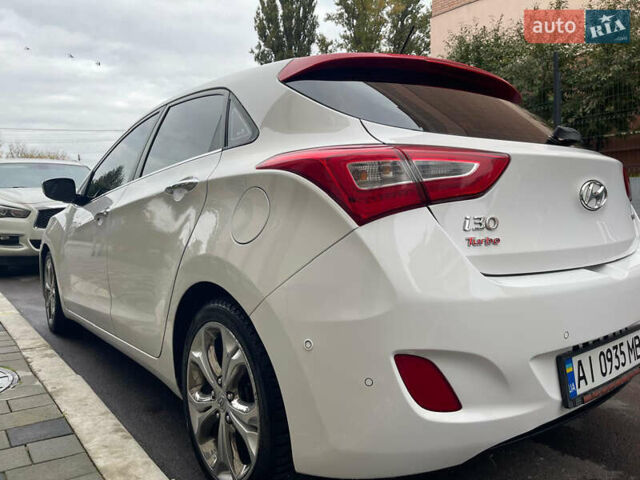 Белый Хендай i30, объемом двигателя 1.58 л и пробегом 134 тыс. км за 8800 $, фото 6 на Automoto.ua