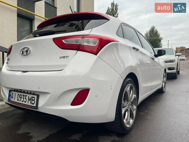 Белый Хендай i30, объемом двигателя 1.58 л и пробегом 134 тыс. км за 8800 $, фото 7 на Automoto.ua