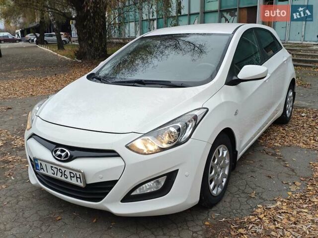 Белый Хендай i30, объемом двигателя 1.4 л и пробегом 105 тыс. км за 8400 $, фото 1 на Automoto.ua