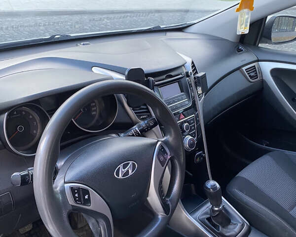 Білий Хендай i30, об'ємом двигуна 1.4 л та пробігом 210 тис. км за 7300 $, фото 14 на Automoto.ua