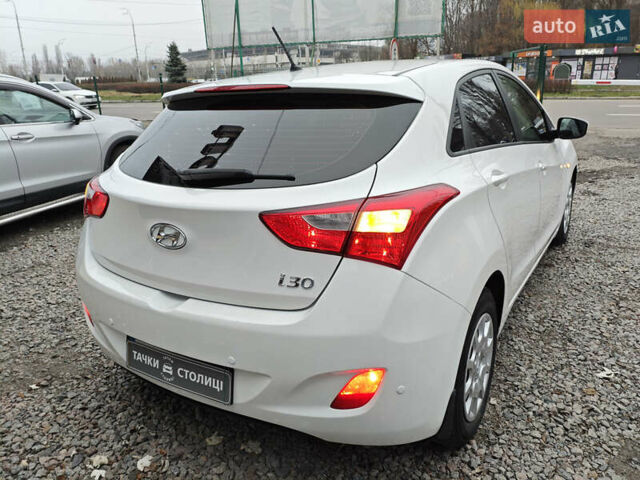 Білий Хендай i30, об'ємом двигуна 1.4 л та пробігом 105 тис. км за 8400 $, фото 5 на Automoto.ua