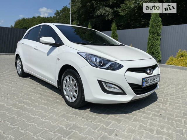 Білий Хендай i30, об'ємом двигуна 1.4 л та пробігом 180 тис. км за 7300 $, фото 9 на Automoto.ua