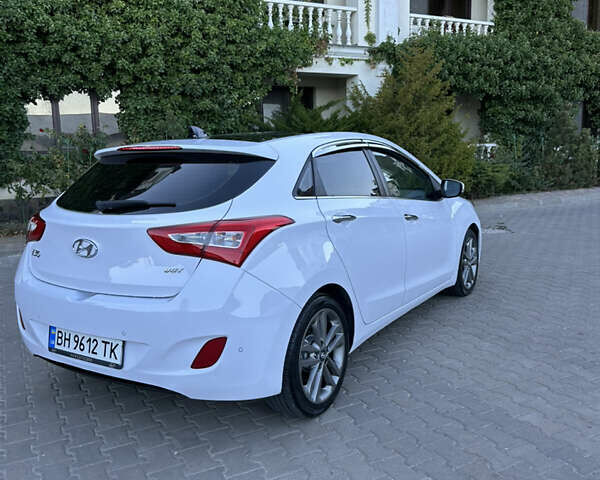 Білий Хендай i30, об'ємом двигуна 1.58 л та пробігом 125 тис. км за 12000 $, фото 7 на Automoto.ua