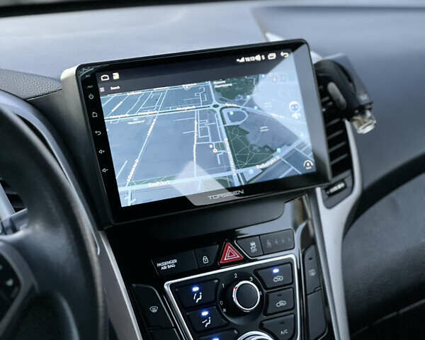 Белый Хендай i30, объемом двигателя 1.58 л и пробегом 227 тыс. км за 7699 $, фото 10 на Automoto.ua