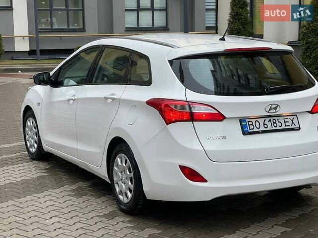 Белый Хендай i30, объемом двигателя 1.58 л и пробегом 223 тыс. км за 6800 $, фото 19 на Automoto.ua
