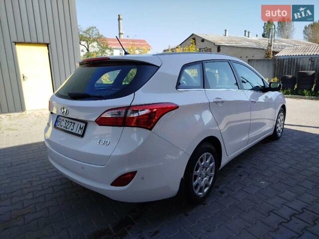 Белый Хендай i30, объемом двигателя 1.6 л и пробегом 234 тыс. км за 7999 $, фото 84 на Automoto.ua