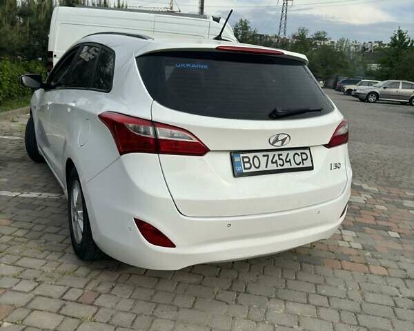 Белый Хендай i30, объемом двигателя 1.6 л и пробегом 284 тыс. км за 7900 $, фото 16 на Automoto.ua