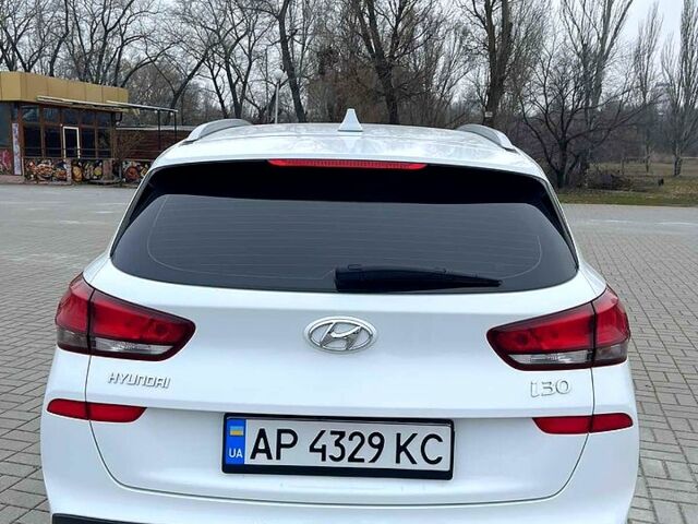 Білий Хендай i30, об'ємом двигуна 1.4 л та пробігом 86 тис. км за 15300 $, фото 4 на Automoto.ua