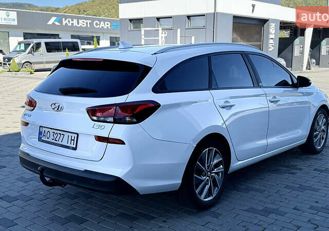 Білий Хендай i30, об'ємом двигуна 1.58 л та пробігом 216 тис. км за 11750 $, фото 4 на Automoto.ua