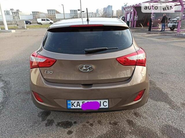 Бежевий Хендай i30, об'ємом двигуна 1.4 л та пробігом 160 тис. км за 7650 $, фото 5 на Automoto.ua