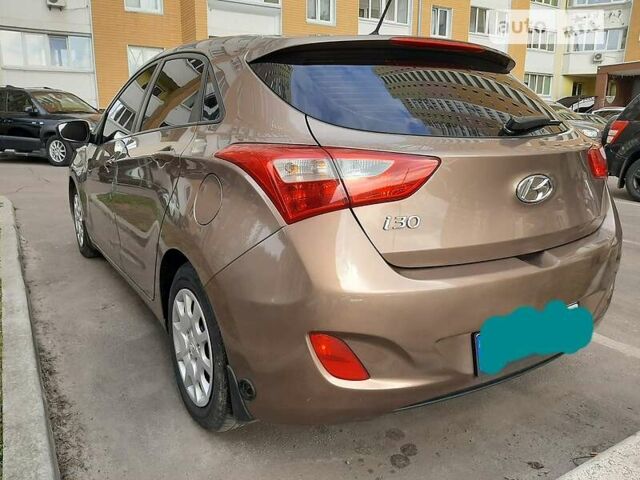 Бежевий Хендай i30, об'ємом двигуна 1.4 л та пробігом 160 тис. км за 7650 $, фото 3 на Automoto.ua