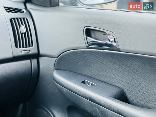 Черный Хендай i30, объемом двигателя 1.6 л и пробегом 190 тыс. км за 6799 $, фото 25 на Automoto.ua