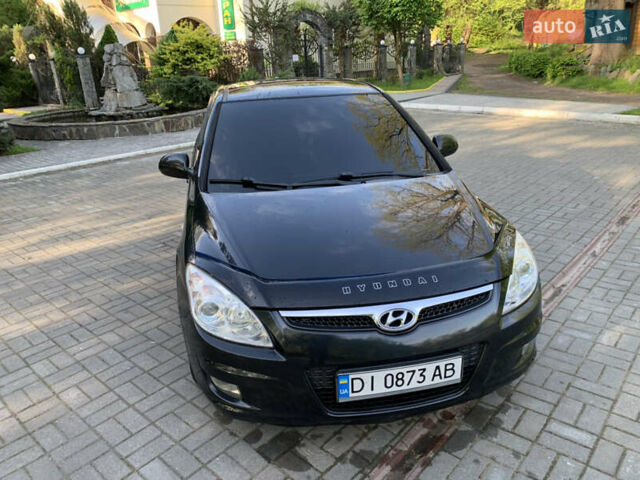 Черный Хендай i30, объемом двигателя 1.6 л и пробегом 233 тыс. км за 6099 $, фото 1 на Automoto.ua
