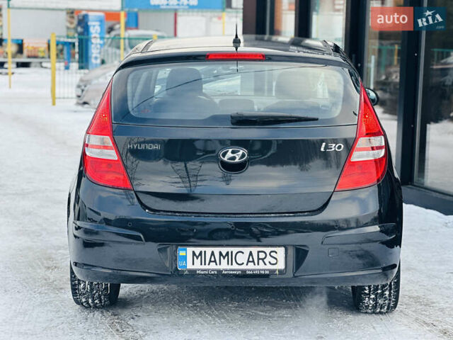 Черный Хендай i30, объемом двигателя 1.6 л и пробегом 190 тыс. км за 6799 $, фото 7 на Automoto.ua