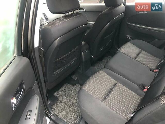 Черный Хендай i30, объемом двигателя 1.59 л и пробегом 150 тыс. км за 5950 $, фото 4 на Automoto.ua