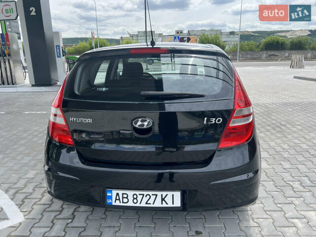 Чорний Хендай i30, об'ємом двигуна 1.6 л та пробігом 193 тис. км за 6799 $, фото 5 на Automoto.ua