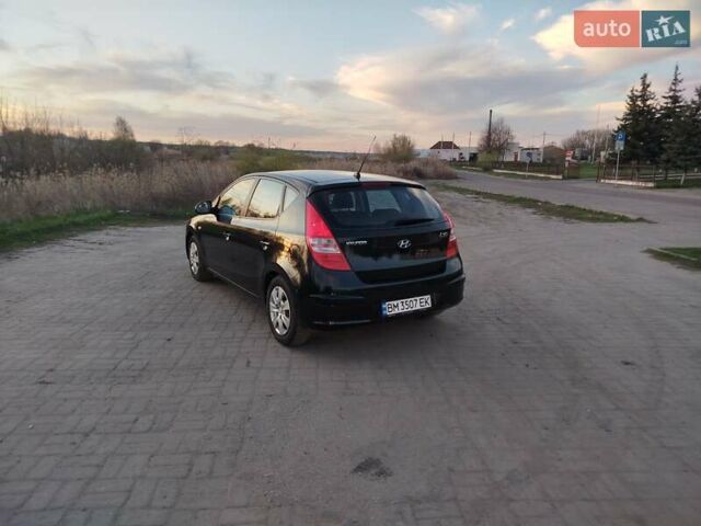 Черный Хендай i30, объемом двигателя 1.6 л и пробегом 250 тыс. км за 5500 $, фото 8 на Automoto.ua