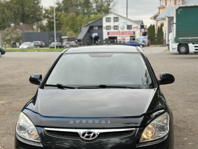Черный Хендай i30, объемом двигателя 1.6 л и пробегом 240 тыс. км за 5999 $, фото 5 на Automoto.ua