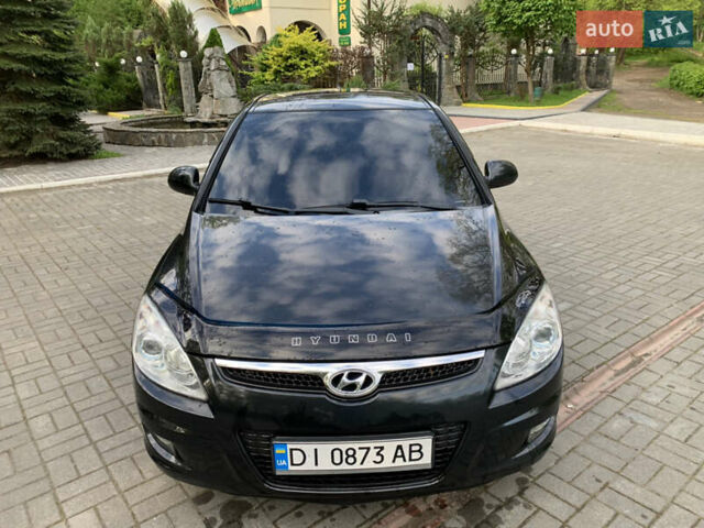 Черный Хендай i30, объемом двигателя 1.6 л и пробегом 233 тыс. км за 6099 $, фото 19 на Automoto.ua