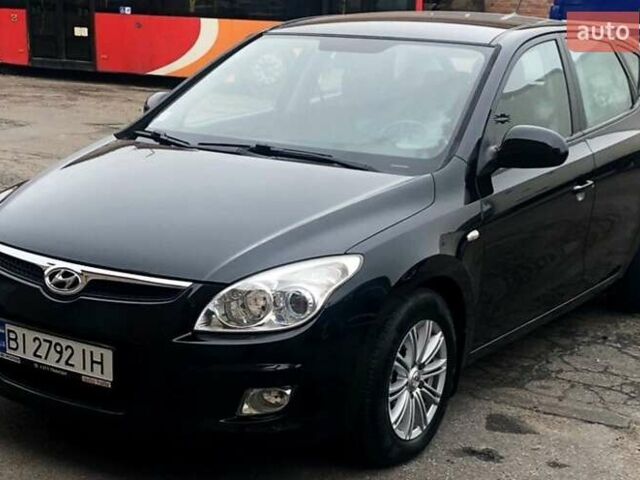 Черный Хендай i30, объемом двигателя 1.59 л и пробегом 150 тыс. км за 5950 $, фото 1 на Automoto.ua