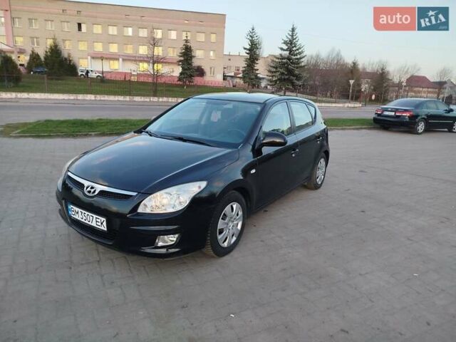 Черный Хендай i30, объемом двигателя 1.6 л и пробегом 250 тыс. км за 5500 $, фото 1 на Automoto.ua
