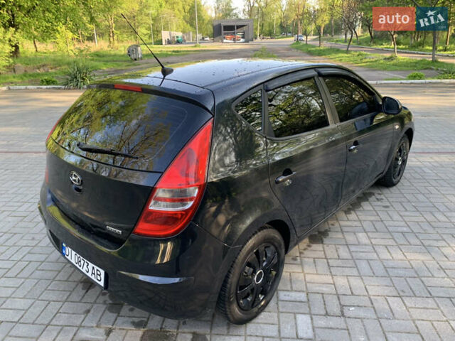 Черный Хендай i30, объемом двигателя 1.6 л и пробегом 233 тыс. км за 6099 $, фото 7 на Automoto.ua