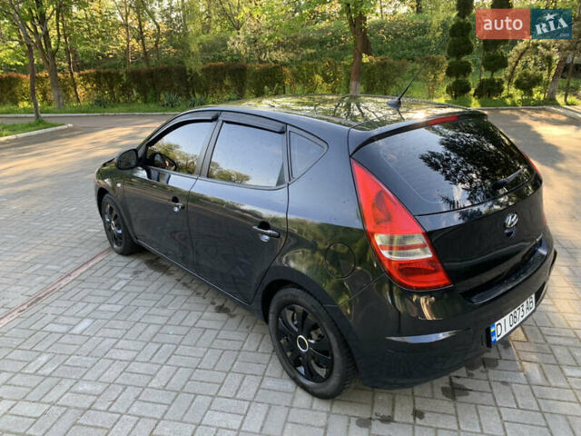 Черный Хендай i30, объемом двигателя 1.6 л и пробегом 233 тыс. км за 6099 $, фото 8 на Automoto.ua