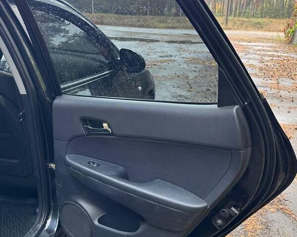 Черный Хендай i30, объемом двигателя 1.59 л и пробегом 150 тыс. км за 5950 $, фото 13 на Automoto.ua