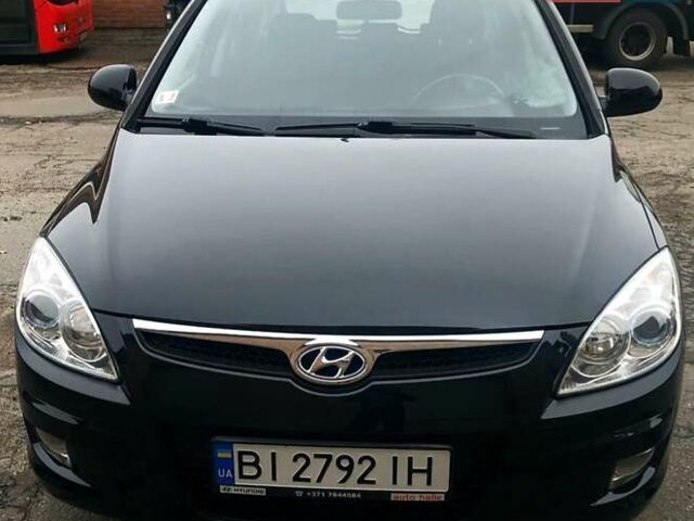Черный Хендай i30, объемом двигателя 1.59 л и пробегом 150 тыс. км за 5950 $, фото 3 на Automoto.ua