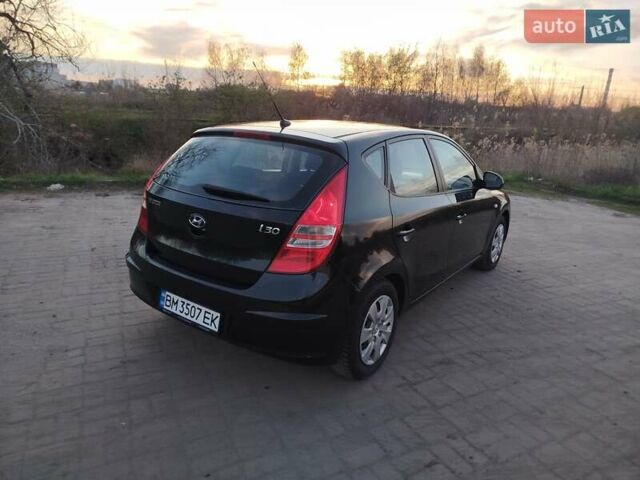 Черный Хендай i30, объемом двигателя 1.6 л и пробегом 250 тыс. км за 5500 $, фото 4 на Automoto.ua