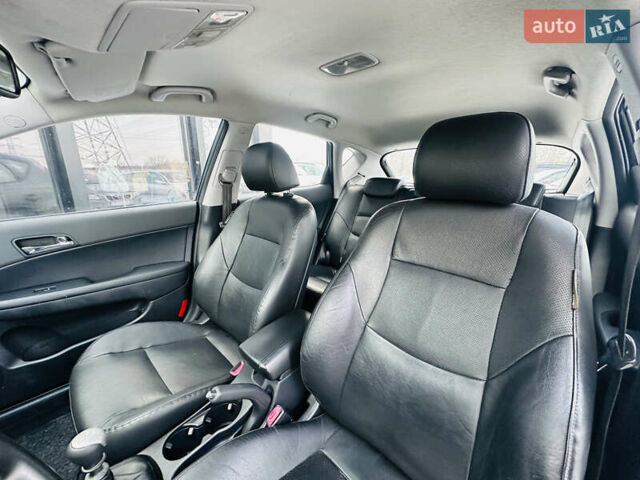 Черный Хендай i30, объемом двигателя 1.6 л и пробегом 190 тыс. км за 6799 $, фото 16 на Automoto.ua