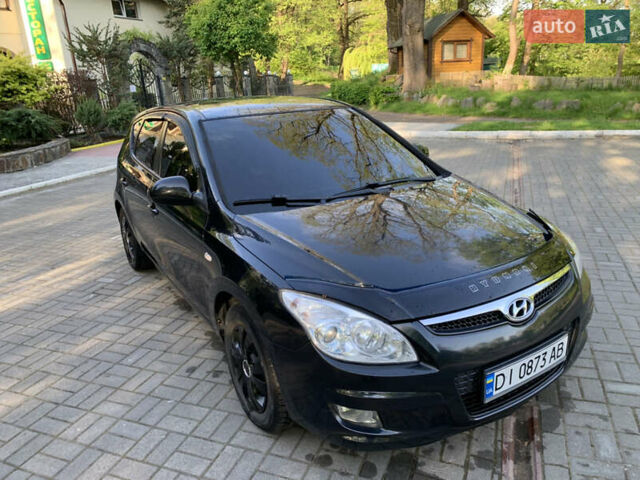 Черный Хендай i30, объемом двигателя 1.6 л и пробегом 233 тыс. км за 6099 $, фото 2 на Automoto.ua