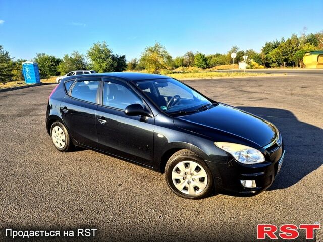 Чорний Хендай i30, об'ємом двигуна 1.4 л та пробігом 224 тис. км за 5200 $, фото 5 на Automoto.ua