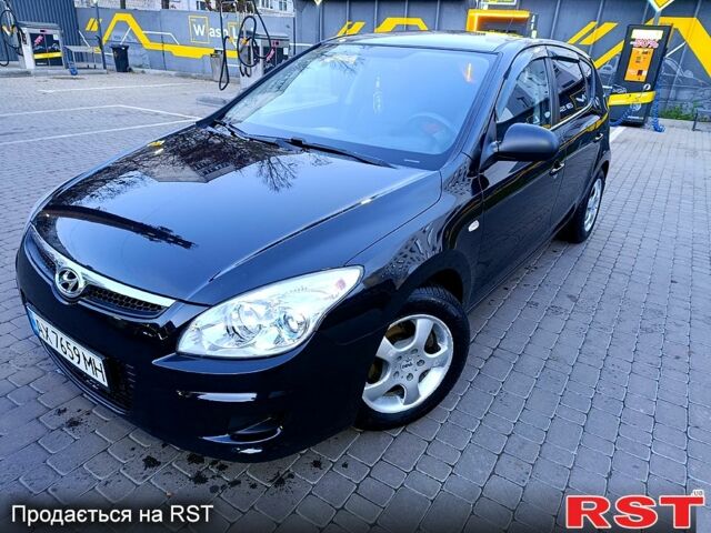 Черный Хендай i30, объемом двигателя 1.4 л и пробегом 170 тыс. км за 5800 $, фото 6 на Automoto.ua