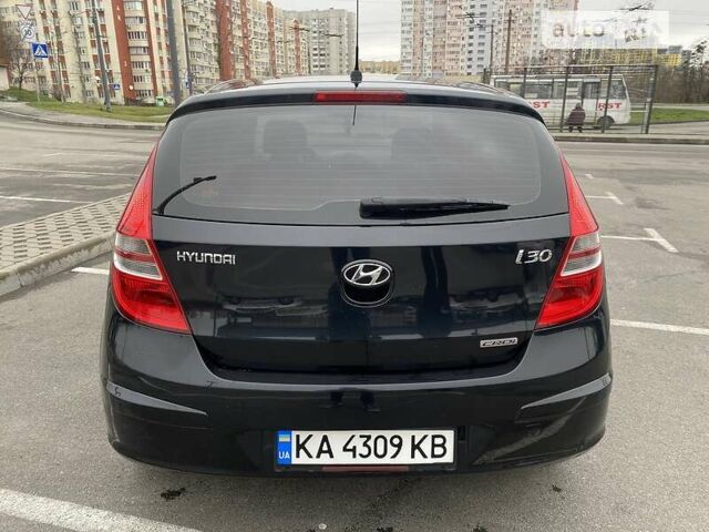 Чорний Хендай i30, об'ємом двигуна 1.6 л та пробігом 239 тис. км за 7100 $, фото 5 на Automoto.ua