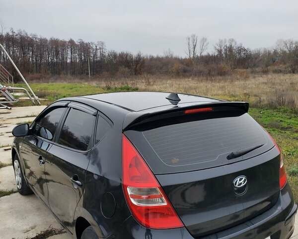 Чорний Хендай i30, об'ємом двигуна 1.6 л та пробігом 365 тис. км за 5000 $, фото 7 на Automoto.ua