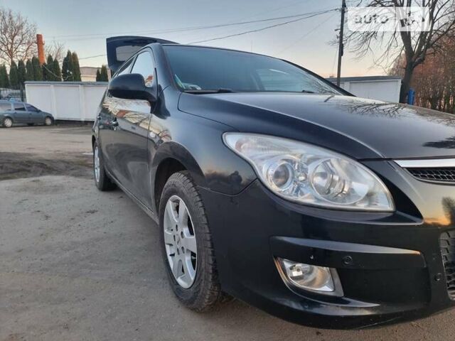 Чорний Хендай i30, об'ємом двигуна 1.4 л та пробігом 216 тис. км за 5999 $, фото 3 на Automoto.ua