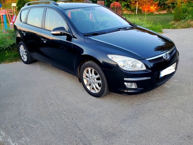 Чорний Хендай i30, об'ємом двигуна 1.6 л та пробігом 227 тис. км за 5500 $, фото 1 на Automoto.ua