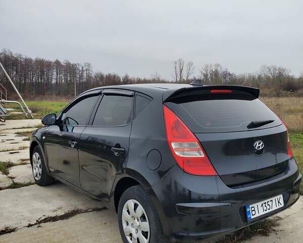 Чорний Хендай i30, об'ємом двигуна 1.6 л та пробігом 365 тис. км за 5000 $, фото 5 на Automoto.ua