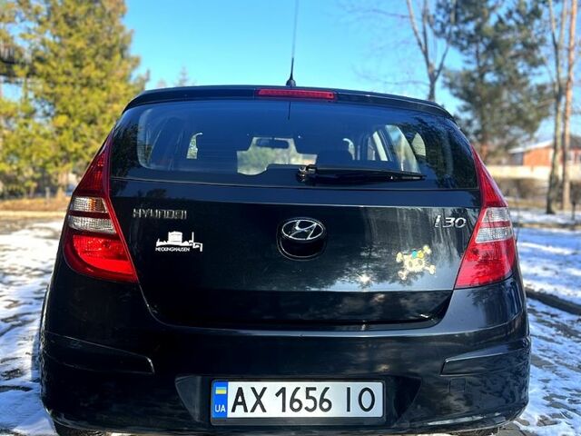 Чорний Хендай i30, об'ємом двигуна 1.4 л та пробігом 195 тис. км за 5650 $, фото 3 на Automoto.ua