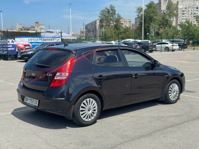 Черный Хендай i30, объемом двигателя 1.4 л и пробегом 128 тыс. км за 5499 $, фото 6 на Automoto.ua