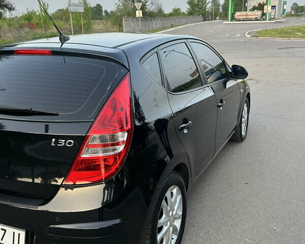 Черный Хендай i30, объемом двигателя 1.6 л и пробегом 140 тыс. км за 6700 $, фото 8 на Automoto.ua