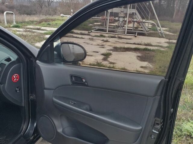 Чорний Хендай i30, об'ємом двигуна 1.6 л та пробігом 365 тис. км за 5000 $, фото 17 на Automoto.ua