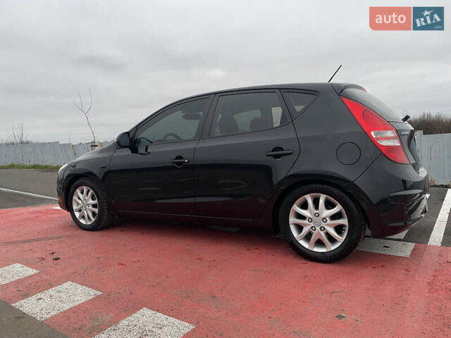 Черный Хендай i30, объемом двигателя 1.6 л и пробегом 253 тыс. км за 5500 $, фото 4 на Automoto.ua