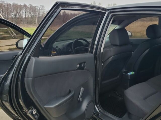 Чорний Хендай i30, об'ємом двигуна 1.6 л та пробігом 365 тис. км за 5000 $, фото 14 на Automoto.ua