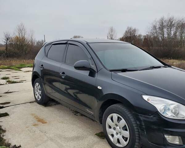 Чорний Хендай i30, об'ємом двигуна 1.6 л та пробігом 365 тис. км за 5000 $, фото 3 на Automoto.ua