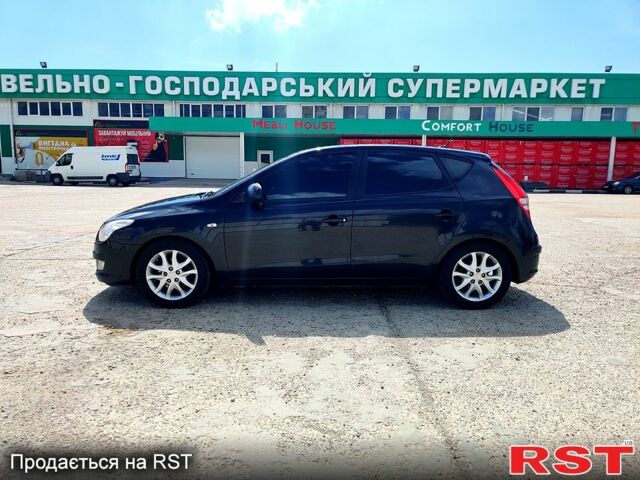 Черный Хендай i30, объемом двигателя 1.6 л и пробегом 185 тыс. км за 6500 $, фото 4 на Automoto.ua