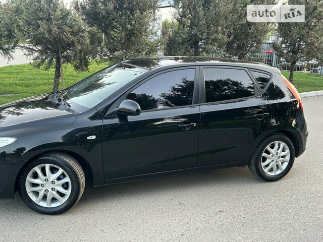 Чорний Хендай i30, об'ємом двигуна 1.6 л та пробігом 140 тис. км за 6700 $, фото 2 на Automoto.ua